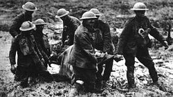 British strectcher bearers. Pilckem Ridge (near Boesinghe), 1 August, 1917. Slogging through mud, they struggle to bring a wounded man out of the line. Casualty evacuation on First World War battlefields was extremely difficult at all times and never more so than during the notorious "Passchendaele" campaign. 