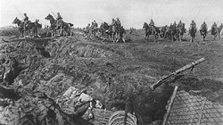 German cavalry cross the first set of British trenches  during the Ludendorff Offensive.